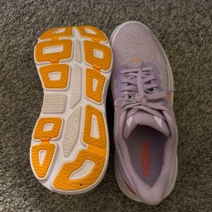 Women’s Hoka Bondi 9 sneakers.